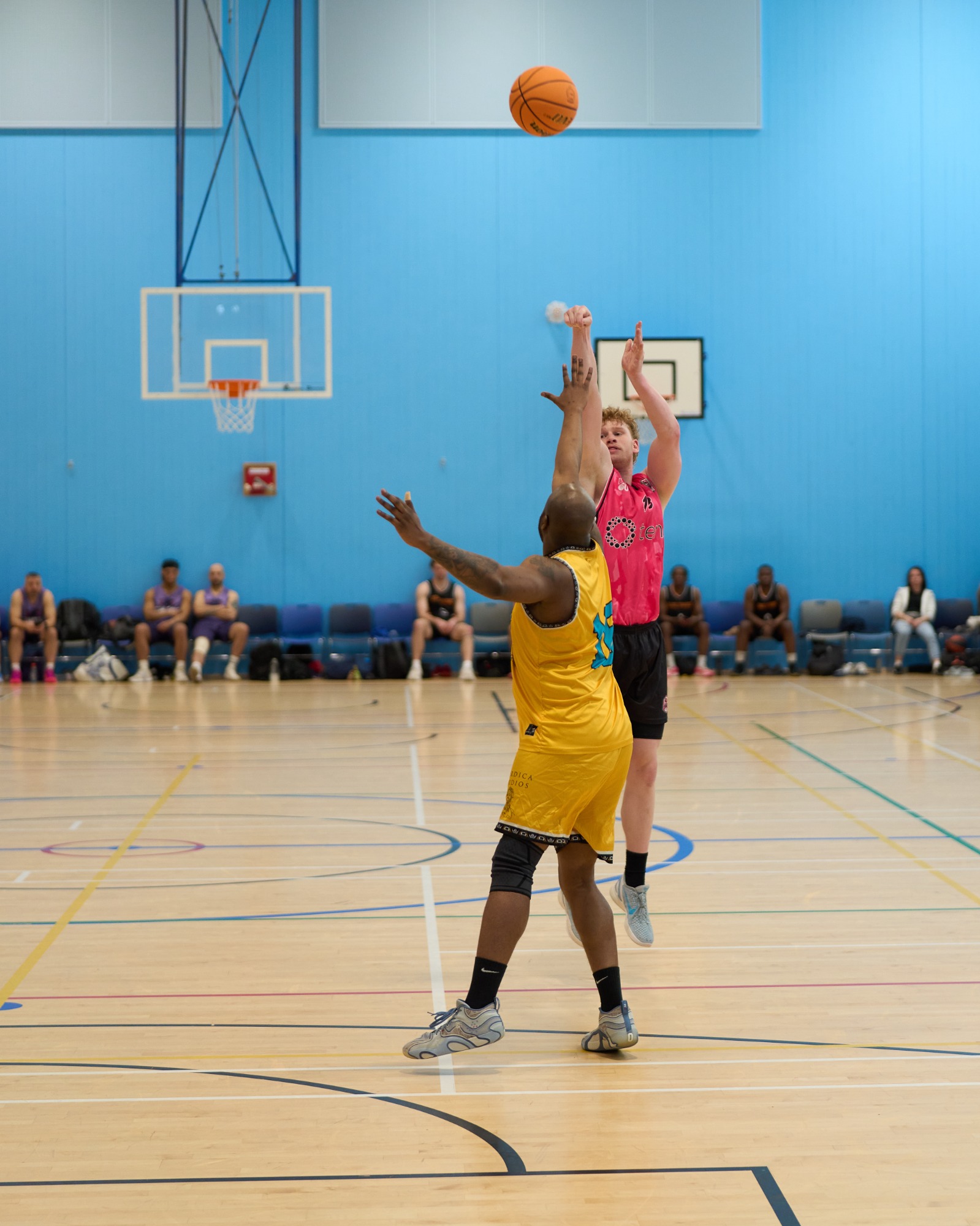 3 Point shot attempt whilst being closely guarded on the three arc.